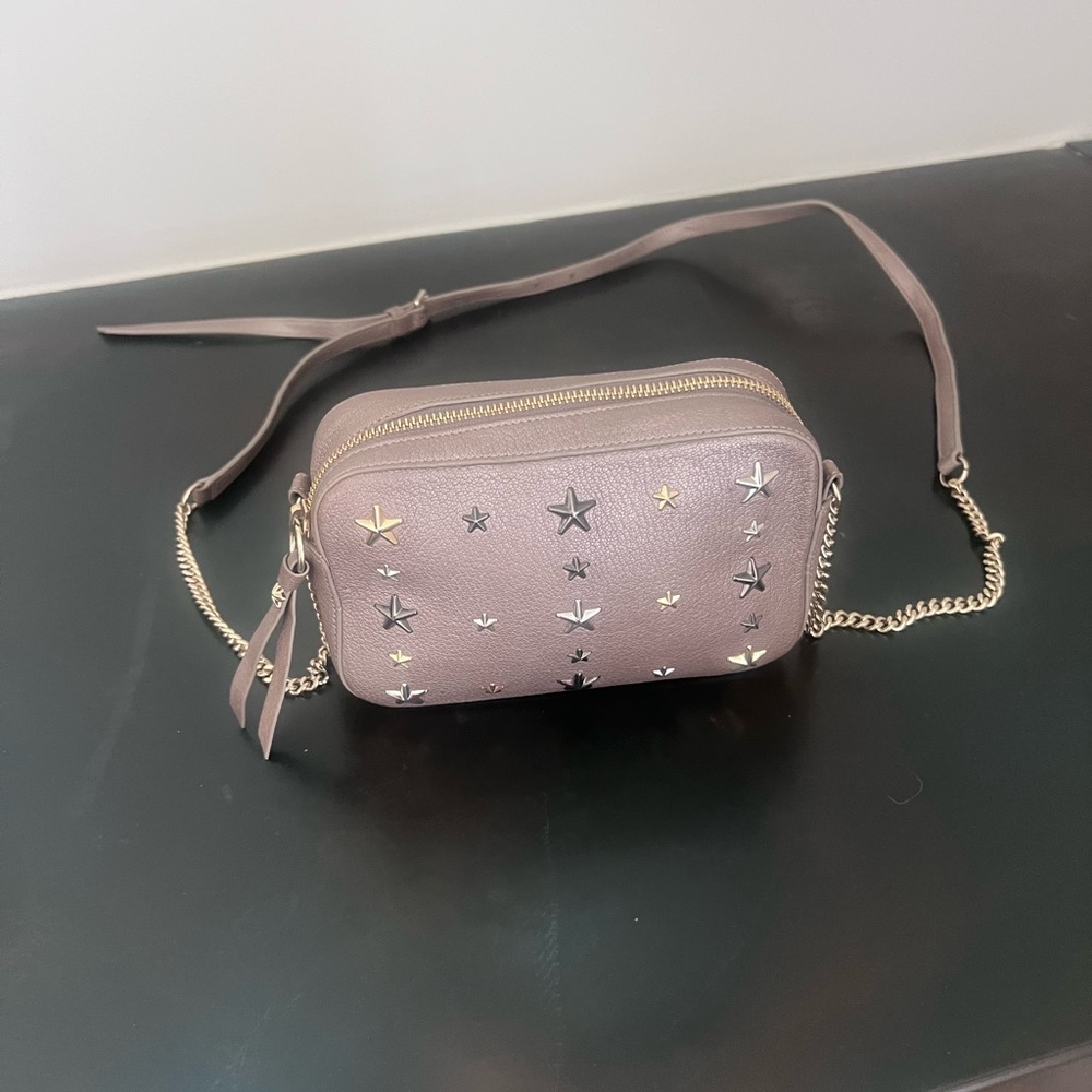 Jimmy Choo gold metallic handbag with stars grommets. Great condition!!7”x5”x2”h